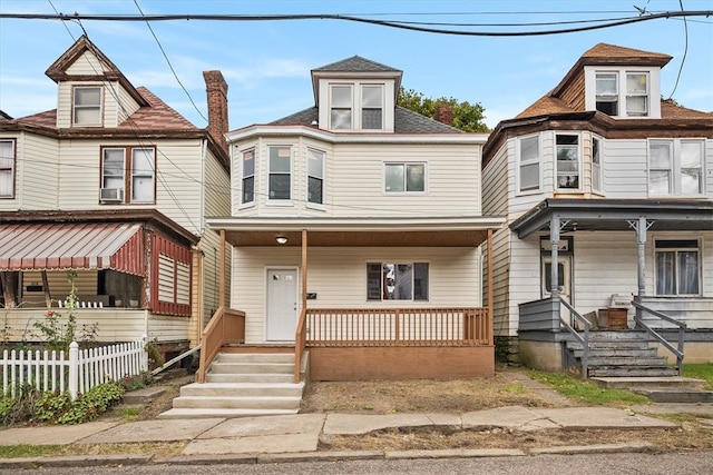 victorian-style house with a porch