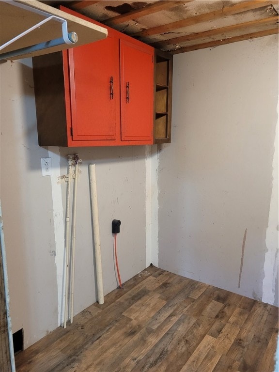 basement featuring hardwood / wood-style floors