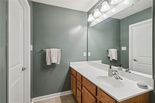 bathroom with vanity and tile patterned floors