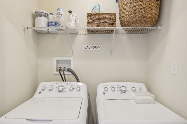 laundry room featuring washer and clothes dryer