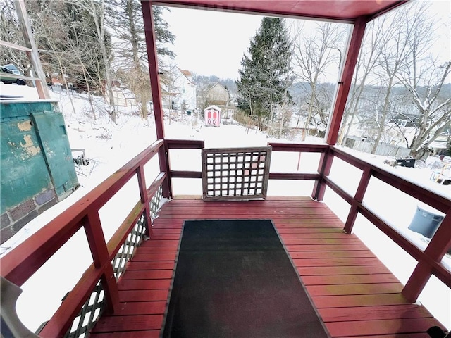 view of snow covered deck