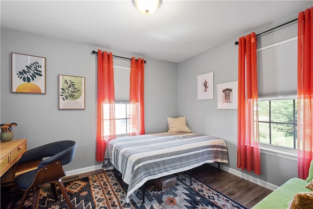 bedroom featuring hardwood / wood-style floors