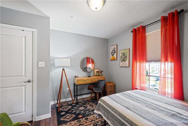 bedroom featuring hardwood / wood-style floors