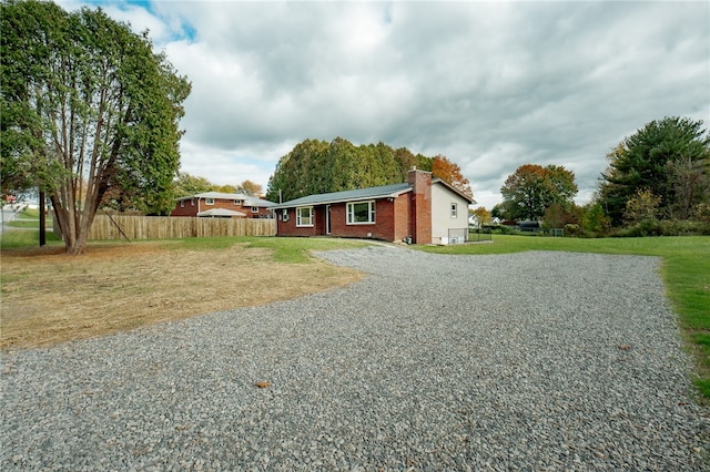 exterior space with a front yard