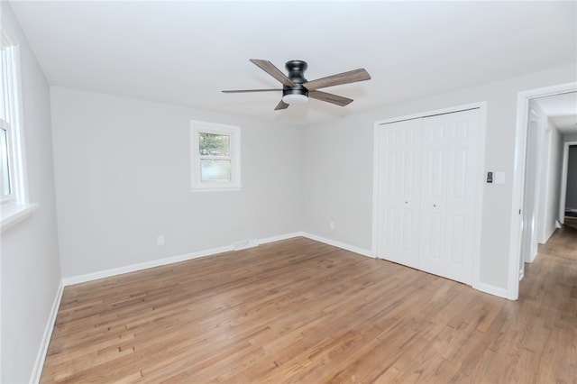 unfurnished bedroom featuring a closet, ceiling fan, and light hardwood / wood-style floors