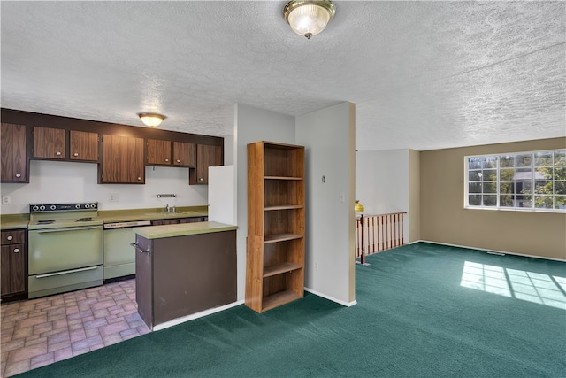 kitchen featuring light carpet, electric range oven, a textured ceiling, and dishwasher