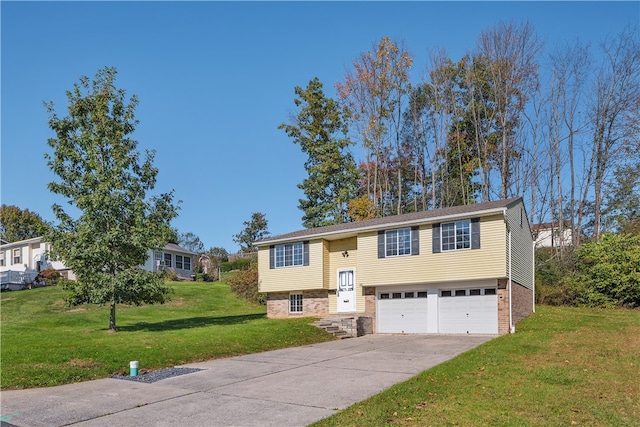 split foyer home featuring a front yard and a garage