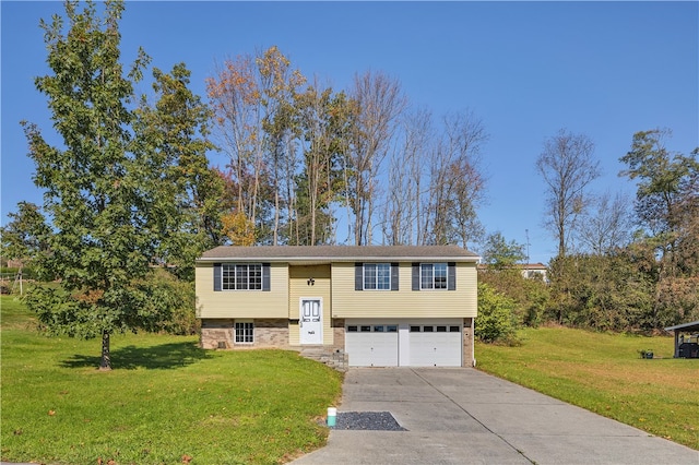 bi-level home featuring a front yard and a garage