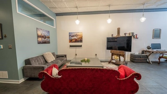 living room with tile patterned floors