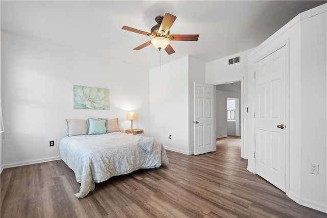 bedroom featuring hardwood / wood-style flooring and ceiling fan