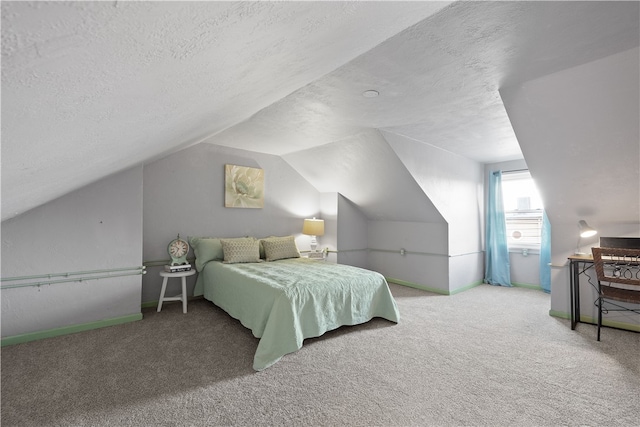 bedroom with carpet flooring, lofted ceiling, and a textured ceiling