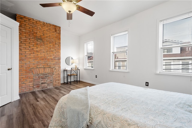 bedroom featuring ceiling fan and wood-type flooring