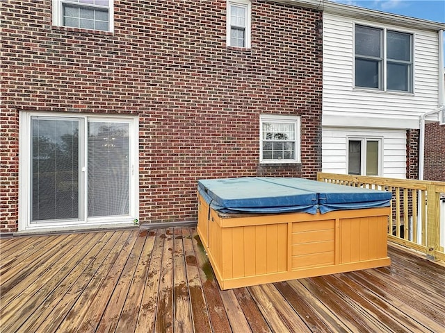 deck with a hot tub