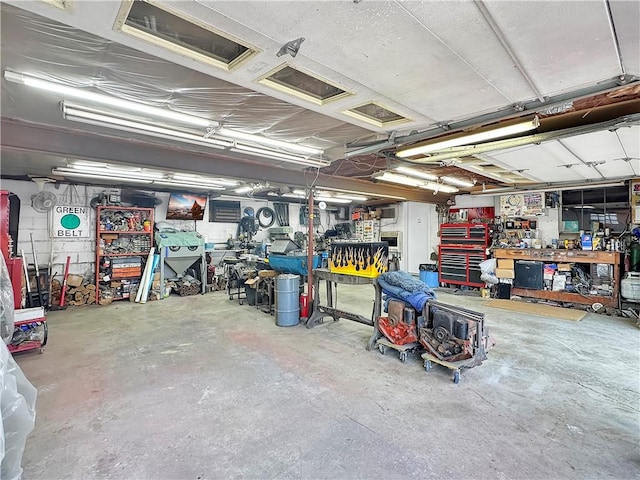 garage with a workshop area