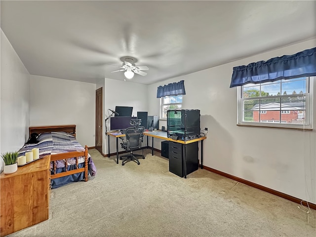 bedroom with carpet flooring, multiple windows, and ceiling fan