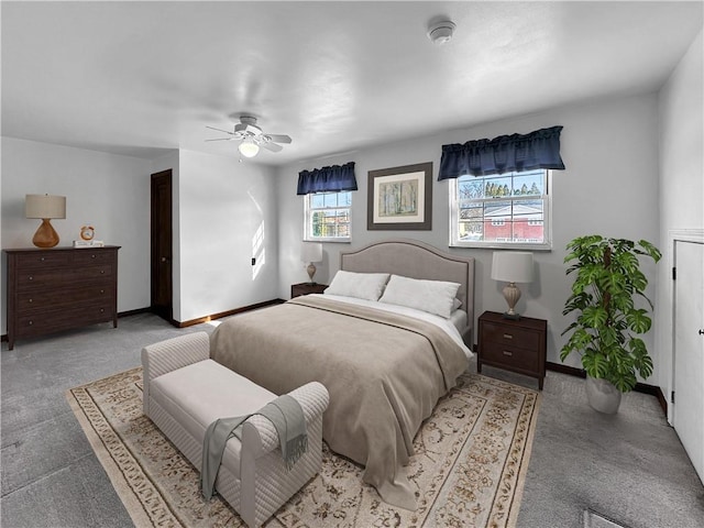 bedroom with light colored carpet and ceiling fan