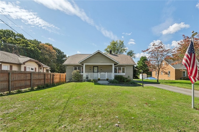 view of front of house featuring a porch and a front lawn