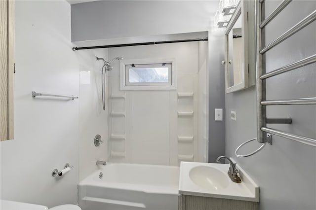 full bathroom with shower / washtub combination, vanity, and toilet