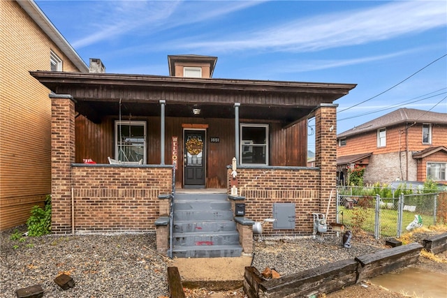 view of front of property featuring covered porch