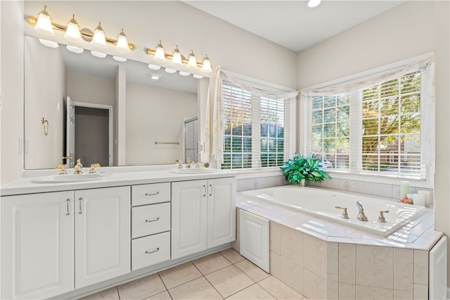 bathroom with vanity, tile patterned floors, and separate shower and tub