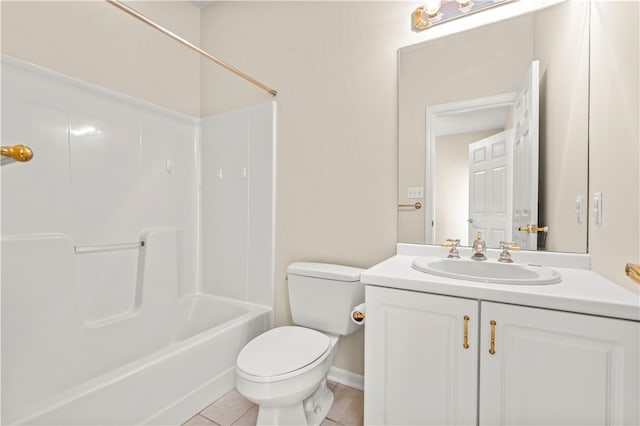 full bathroom featuring toilet, vanity, tile patterned floors, and tub / shower combination