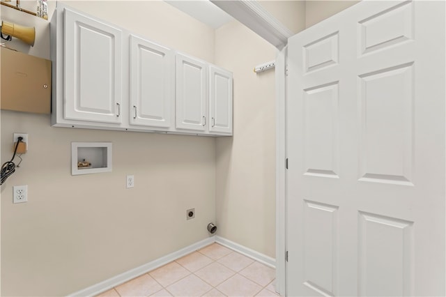 laundry room with light tile patterned floors, electric dryer hookup, washer hookup, and cabinets