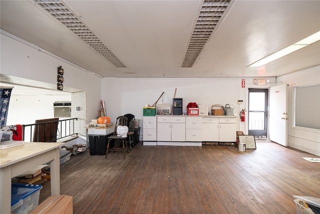 misc room featuring dark wood-type flooring