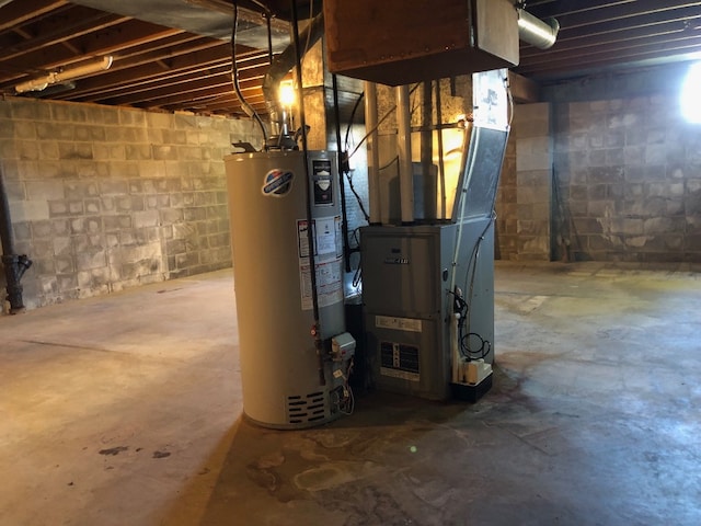 basement featuring gas water heater and heating unit