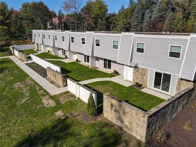 exterior space featuring a lawn