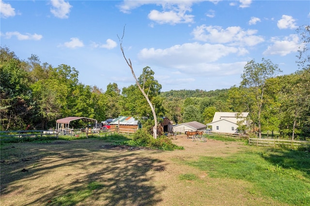 view of yard featuring a rural view