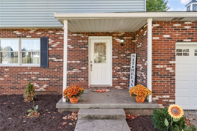 property entrance with a garage