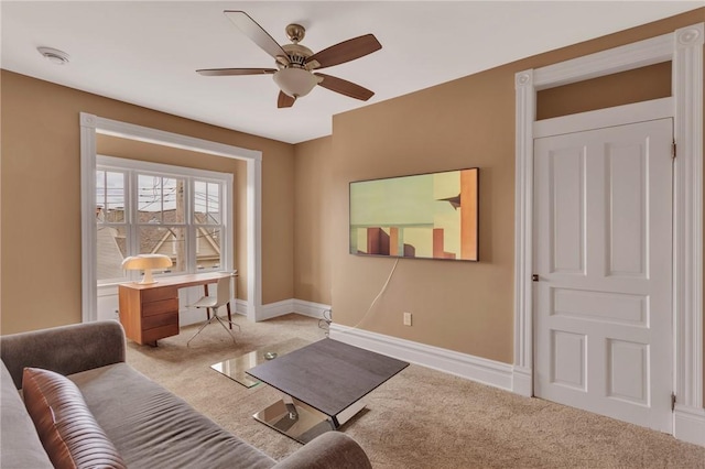 110 Pius St, South Side, PA 15203 - living room with carpet, baseboards, and a ceiling fan