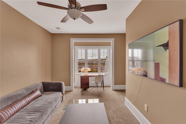 110 Pius St, South Side, PA 15203 - living room with carpet, baseboards, and a ceiling fan