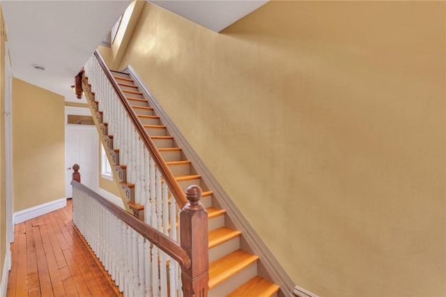 110 Pius St, South Side, PA 15203 - stairs with wood-type flooring and baseboards