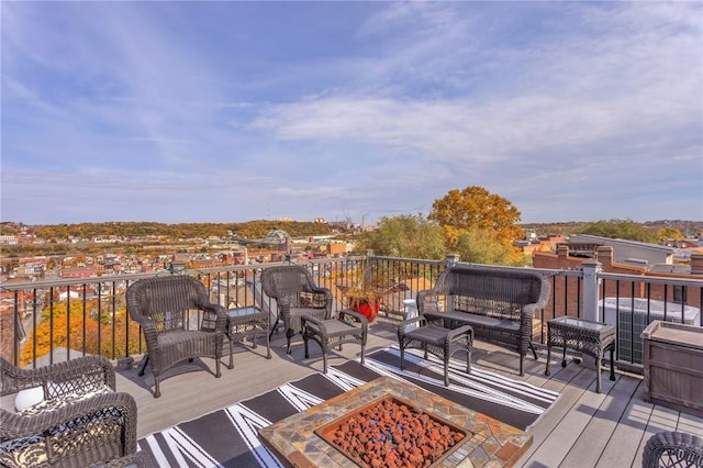 110 Pius St, South Side, PA 15203 - wooden deck featuring an outdoor living space with a fire pit