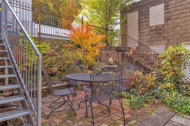 110 Pius St, South Side, PA 15203 - view of patio featuring stairs and outdoor dining space