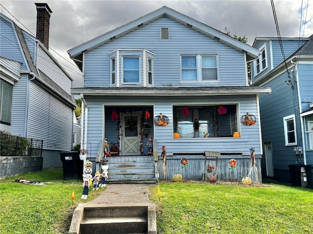 1229 Main St, Aliquippa, PA 15001 - view of front facade with a front lawn and covered porch