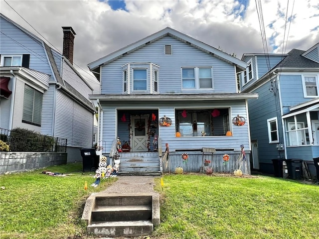 1229 Main St, Aliquippa, PA 15001 - view of front of property with a front yard and covered porch