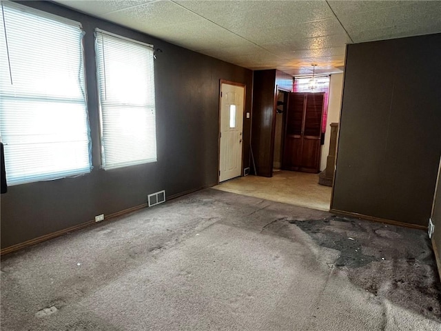 1229 Main St, Aliquippa, PA 15001 - carpeted spare room with plenty of natural light