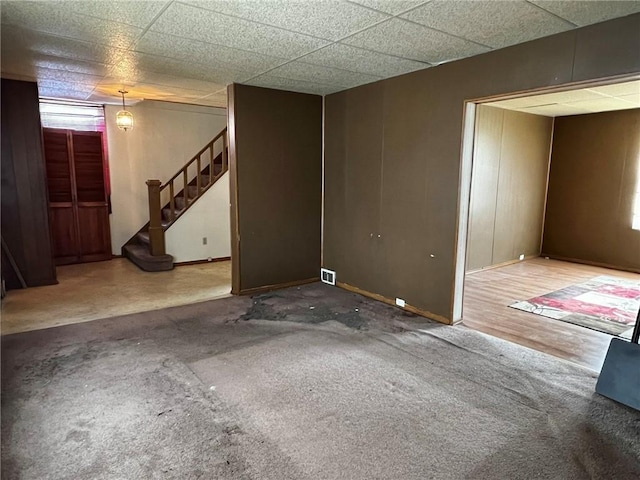 1229 Main St, Aliquippa, PA 15001 - unfurnished living room with stairs, carpet, and baseboards