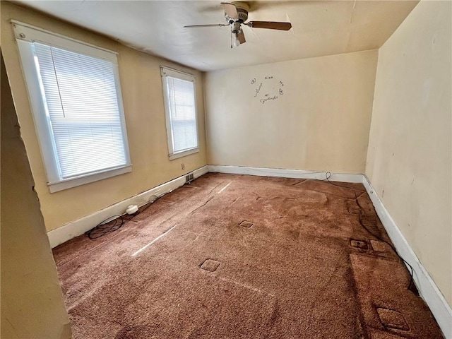 1229 Main St, Aliquippa, PA 15001 - carpeted empty room with a ceiling fan and baseboards
