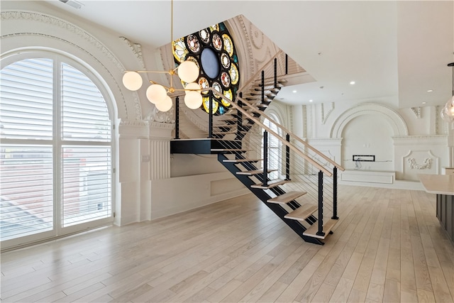 stairway featuring wood-type flooring