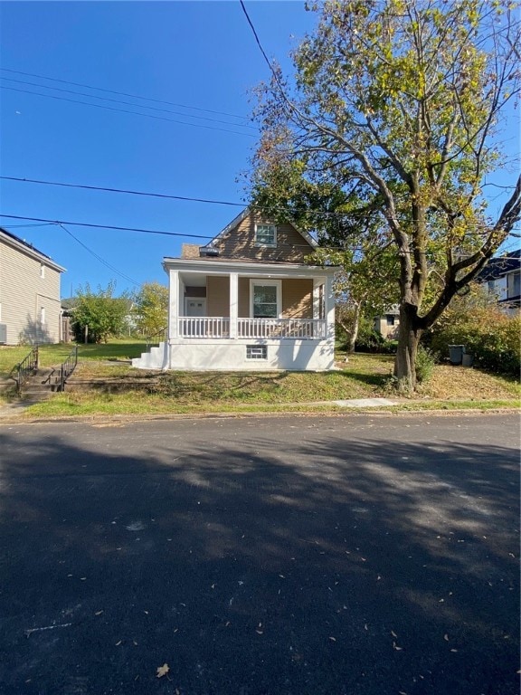 bungalow-style home with covered porch