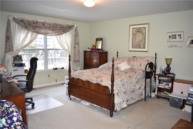 bedroom with light colored carpet