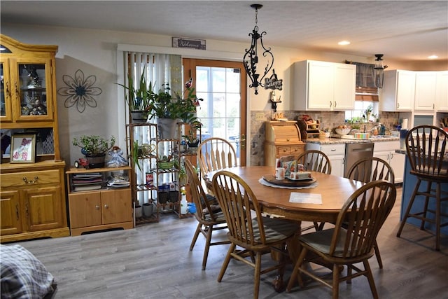 dining space featuring dark hardwood / wood-style floors