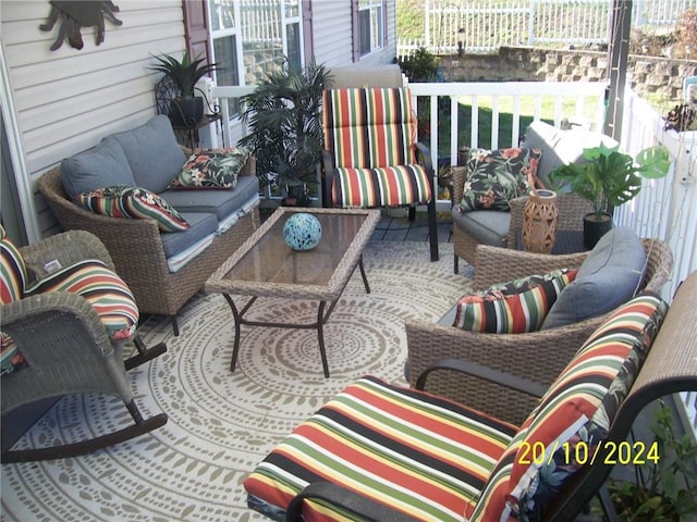 balcony with an outdoor hangout area