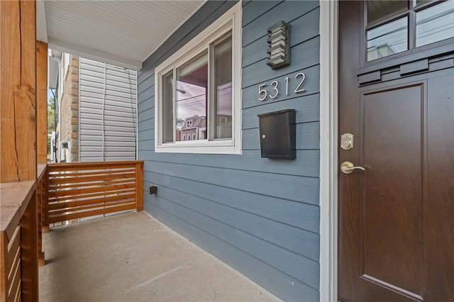 balcony featuring a porch