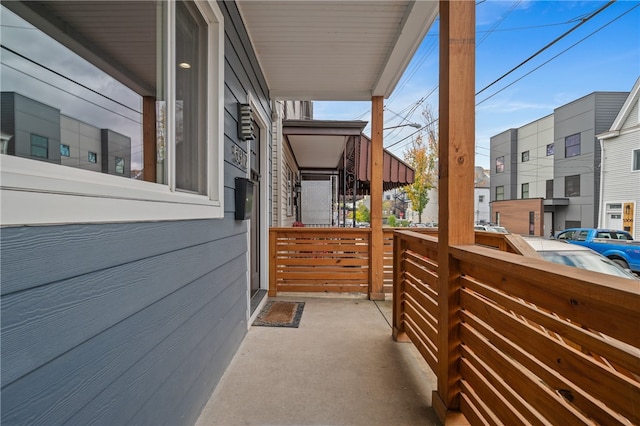 balcony featuring covered porch