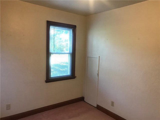 unfurnished room featuring carpet floors