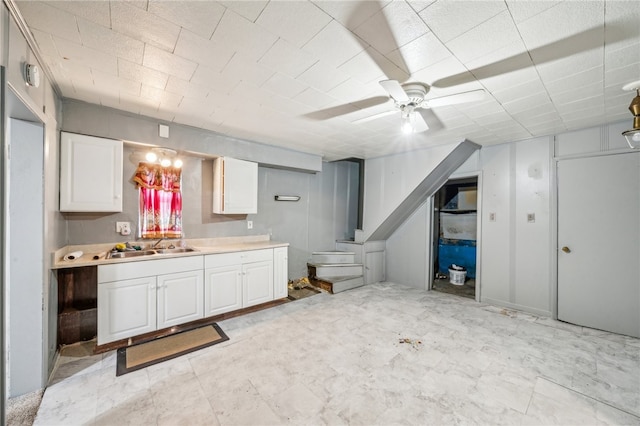 bathroom featuring vanity and ceiling fan